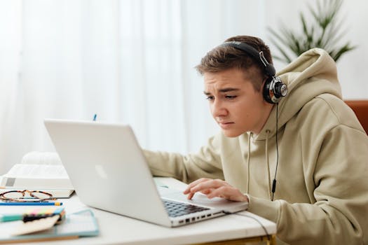 student using a laptop for studying