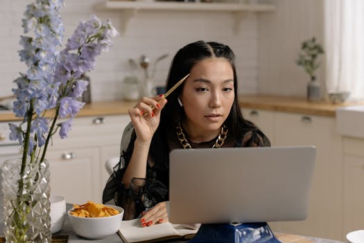 student studying with snacks and water