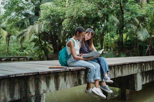 happy student studying with friends