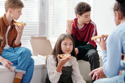 happy student enjoying a snack