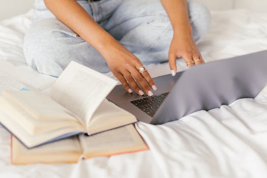 student studying in bed