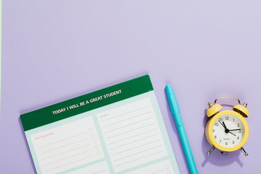 student using a planner to set goals