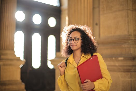 student studying in library