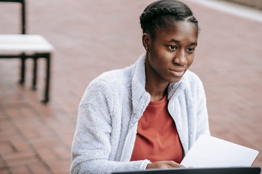 A student studying with a planner